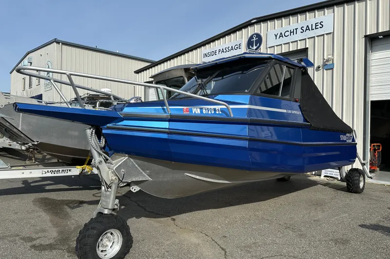 Slide: The Image of 2017 Stabicraft 2100 Supercab boat displayed at yacht sales facility. - 12