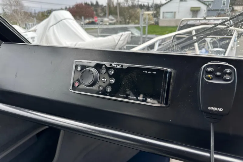 Slide: The Image of 2017 Stabicraft 2100 Supercab dashboard with Fusion MS-UD750 stereo and Simrad remote. - 18