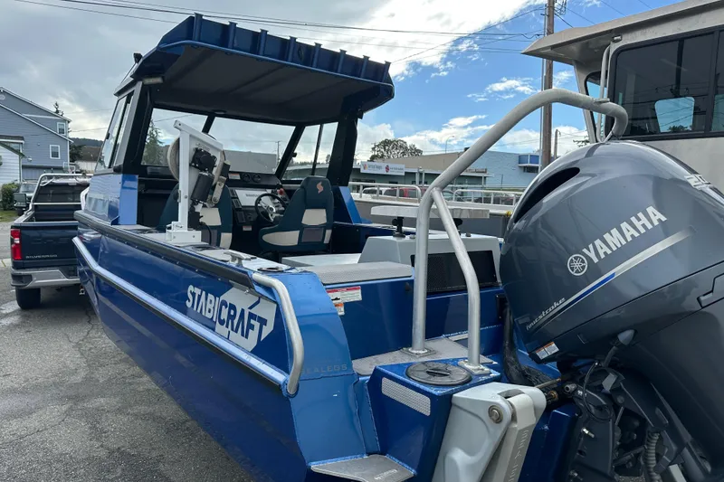 Slide: The Image of 2017 Stabicraft 2100 Supercab boat with Yamaha outboard motor, parked on a trailer. - 5