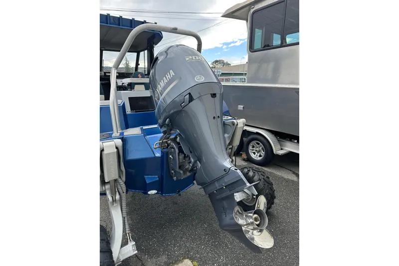 Slide: The Image of 2017 Stabicraft 2100 Supercab with Yamaha outboard motor, parked on a trailer. - 8