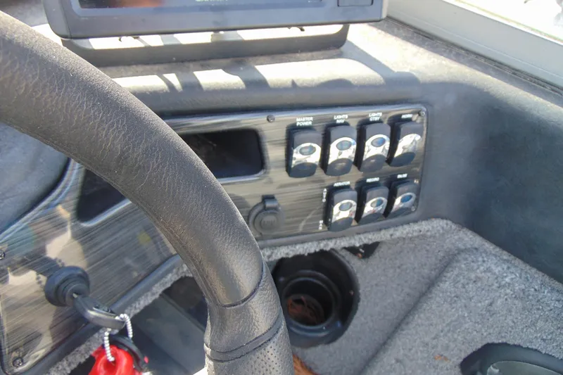 Slide: The Image of Control panel of 2018 Crestliner 1850 Raptor WT boat with steering wheel. - 14