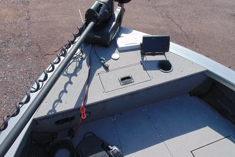 Slide: The Image of 2018 Crestliner 1850 Raptor WT boat deck with trolling motor and fish finder. - 17