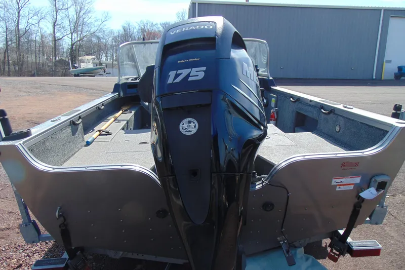 Slide: The Image of 2018 Crestliner 1850 Raptor WT boat with Mercury 175 Verado engine, parked outdoors. - 5