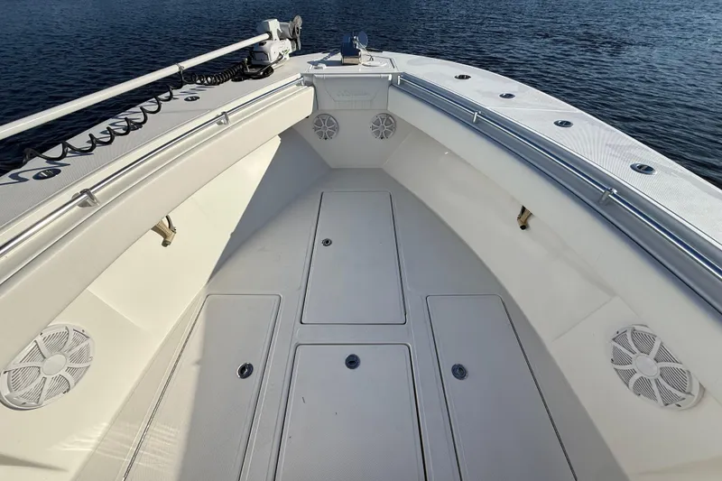 Slide: The Image of 2020 Sea Hunter 31 Tournament boat deck with storage compartments and speakers. - 28