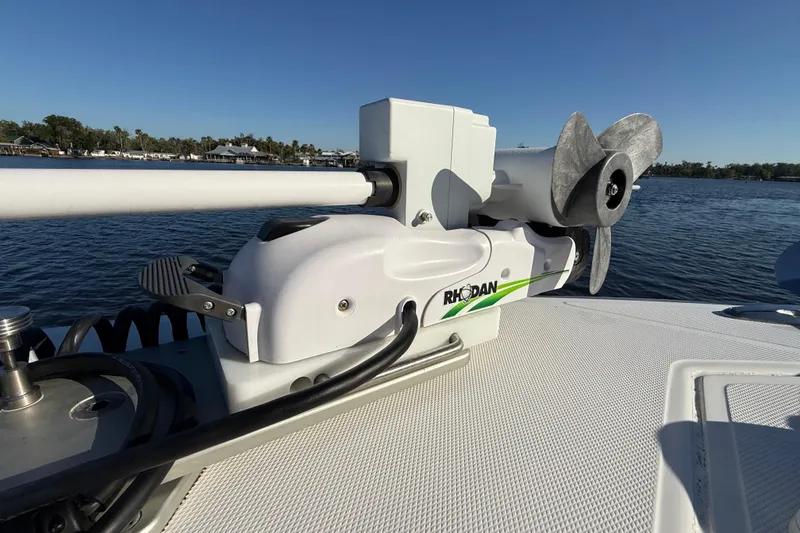 Slide: The Image of Rhodan trolling motor on 2020 Sea Hunter 31 Tournament boat, docked on calm water. - 30
