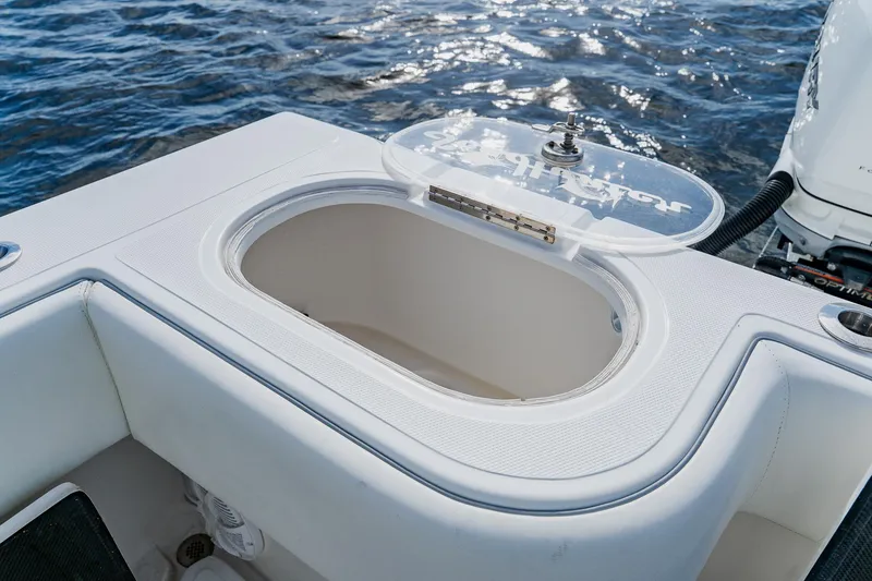 Slide: The Image of Livewell on 2020 SeaHunter 31 Tournament boat, open lid, ocean background. - 52