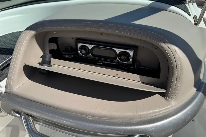 Slide: The Image of 2005 Cobalt 240 boat dashboard with Sony stereo system. - 11