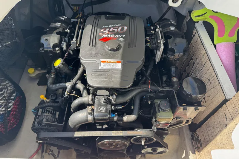 Slide: The Image of Engine compartment of a 2005 Cobalt 240 boat with MerCruiser 350 MAG MPI engine. - 6