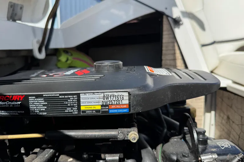 Slide: The Image of Engine compartment of a 2005 Cobalt 240 boat with visible specifications label. - 7