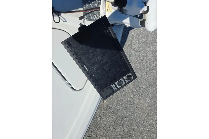Slide: The Image of Garmin marine device on 2021 Blue Wave 2400 PureBay boat deck. - 10