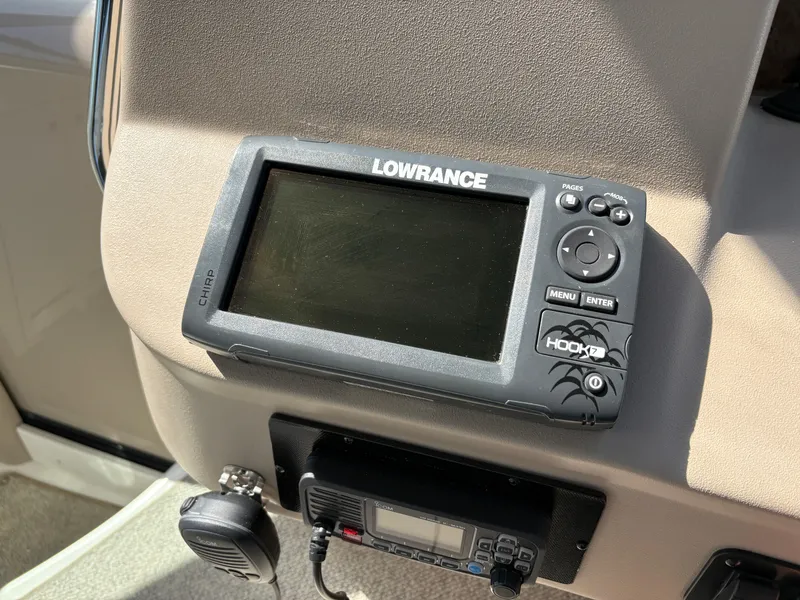 Slide: The Image of Lowrance Hook2 fish finder on 1999 Sea Ray 340 Sundancer dashboard. - 16