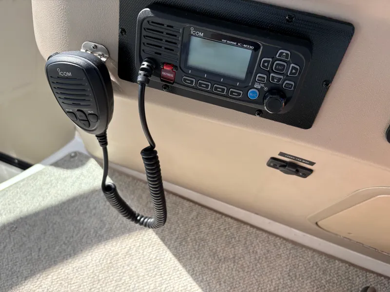 Slide: The Image of ICOM marine radio on 1999 Sea Ray 340 Sundancer boat dashboard. - 17