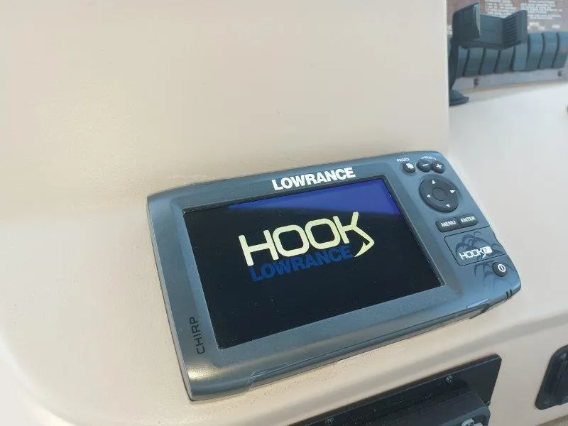 Slide: The Image of Lowrance HOOK fish finder on 1999 Sea Ray 340 Sundancer dashboard. - 34