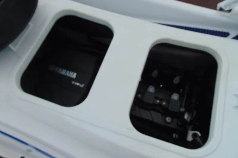 Slide: The Image of 2022 Yamaha WaveRunner VX Deluxe engine compartment, showcasing internal components. - 11