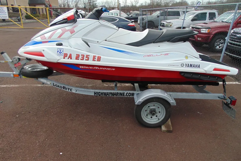 Slide: The Image of 2022 Yamaha WaveRunner VX Deluxe on trailer in parking lot. - 4