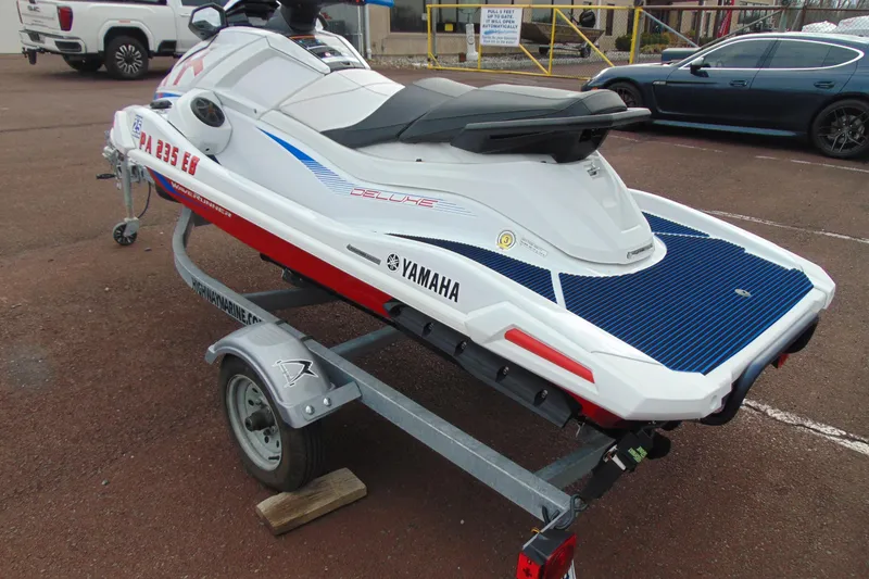 Slide: The Image of 2022 Yamaha WaveRunner VX Deluxe on trailer, parked outdoors. - 5