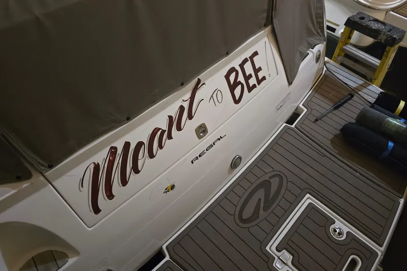 Slide: The Image of 2008 Regal 3060 Window Express boat with "Meant to Bee" name on the stern. - 10