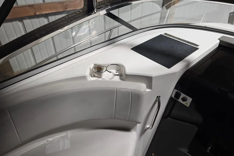 Slide: The Image of Interior view of a 2008 Regal 3060 Window Express boat cockpit area. - 18