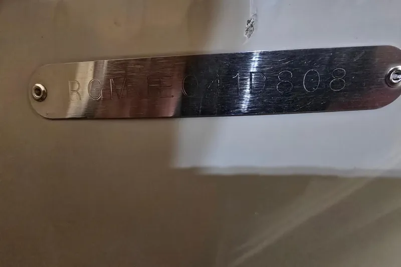 Slide: The Image of Metal identification plate on 2008 Regal 3060 Window Express boat. - 32