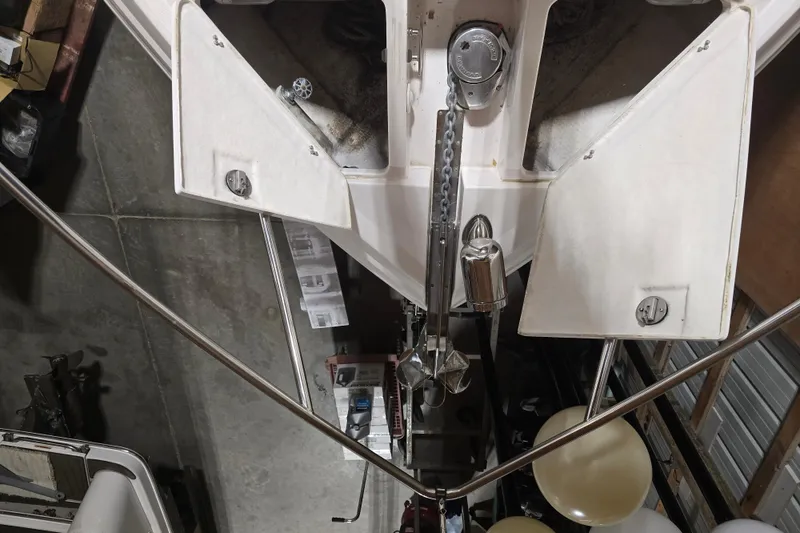 Slide: The Image of 2008 Regal 3060 Window Express boat anchor and chain in storage. - 7