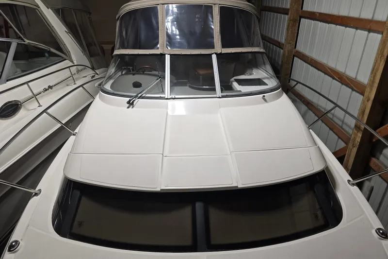 Slide: The Image of 2008 Regal 3060 Window Express boat in storage, front view. - 8