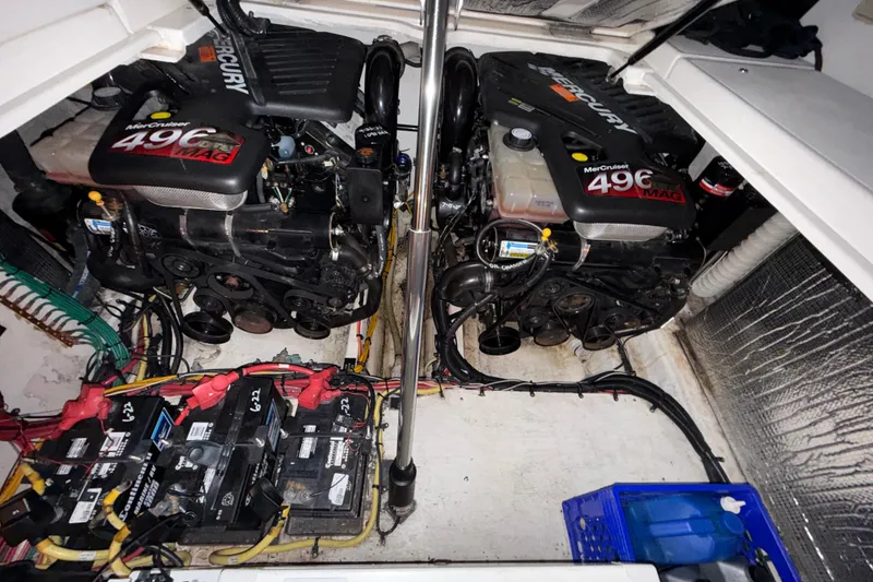 Slide: The Image of Engine compartment of 2004 Cruisers Yachts 340 Express with twin MerCruiser 496 MAG engines. - 19