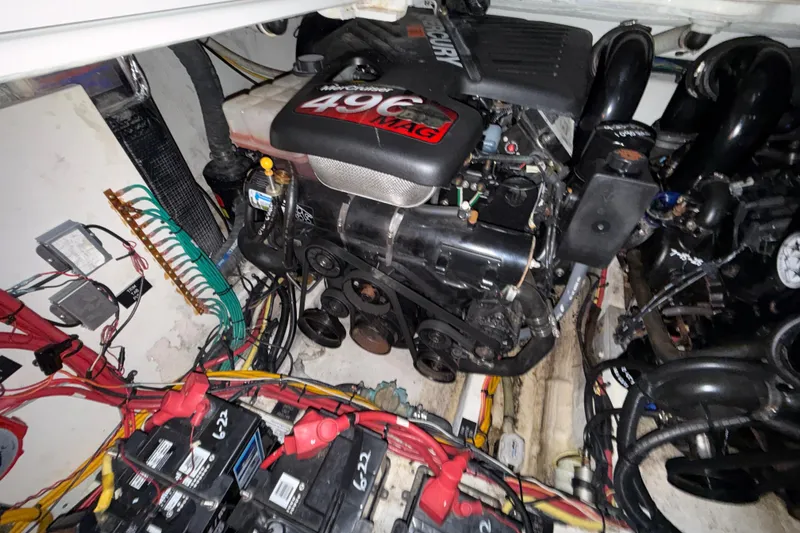 Slide: The Image of Engine compartment of a 2004 Cruisers Yachts 340 Express with MerCruiser 496 MAG engine. - 22