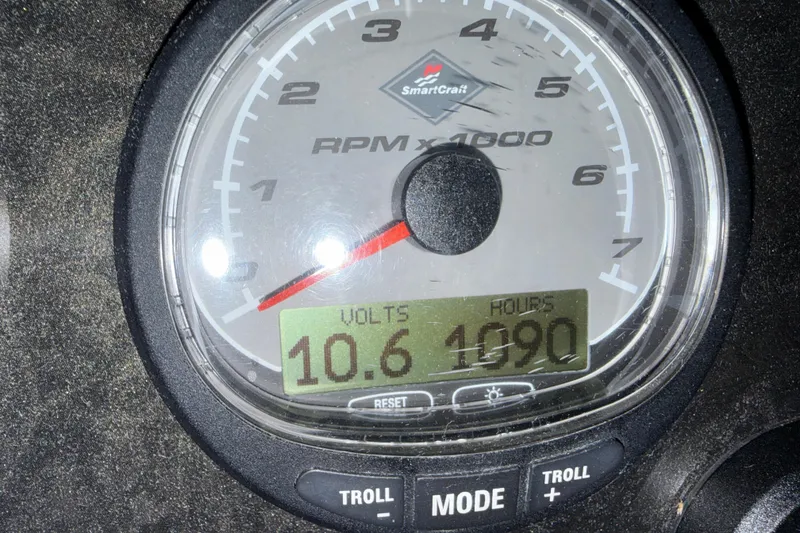 Slide: The Image of Close-up of a 2004 Cruisers Yachts 340 Express tachometer displaying 10.6 volts and 1090 hours. - 26