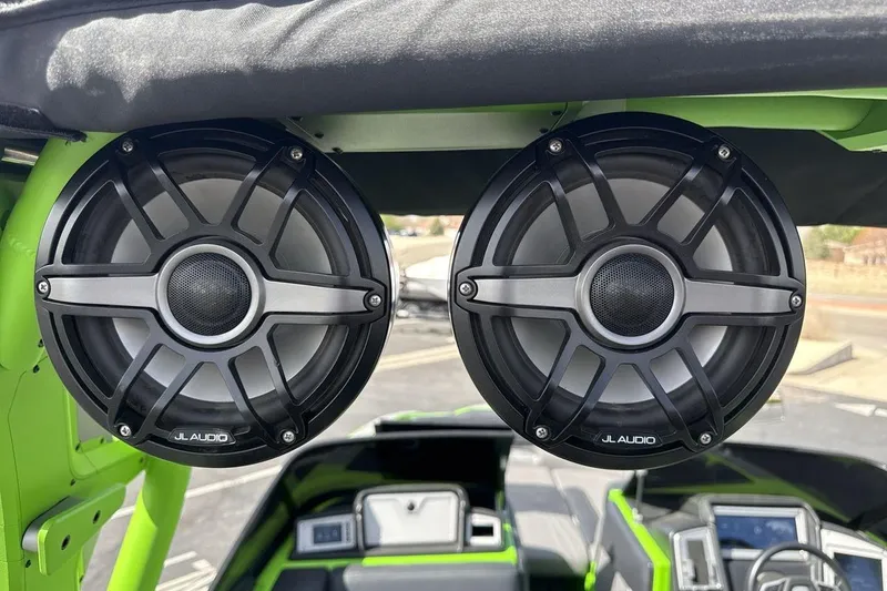Slide: The Image of JL Audio speakers on a 2022 Supra SA 450 boat, showcasing premium sound system. - 21