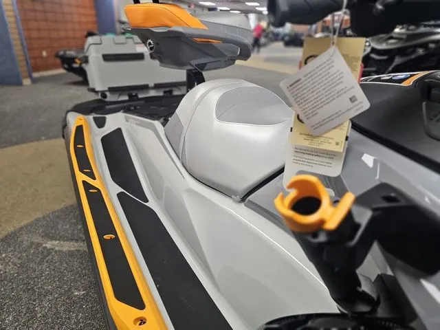 Slide: The Image of 2026 Sea-Doo FISH PRO jet ski in a showroom. - 12