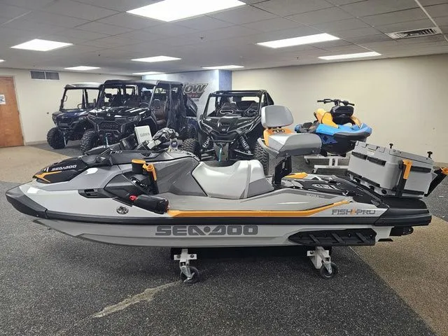 Slide: The Image of 2026 Sea-Doo FISH PRO jet ski in showroom. - 4