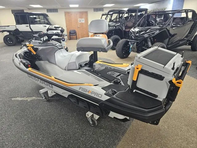 Slide: The Image of 2026 Sea-Doo FISH PRO jet ski in showroom. - 5
