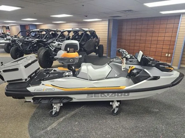 Slide: The Image of 2026 Sea-Doo FISH PRO jet ski in showroom. - 8