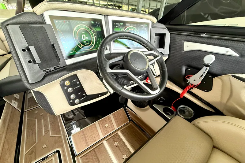 Slide: The Image of 2021 Centurion Ri245 boat dashboard with modern controls and digital displays. - 29