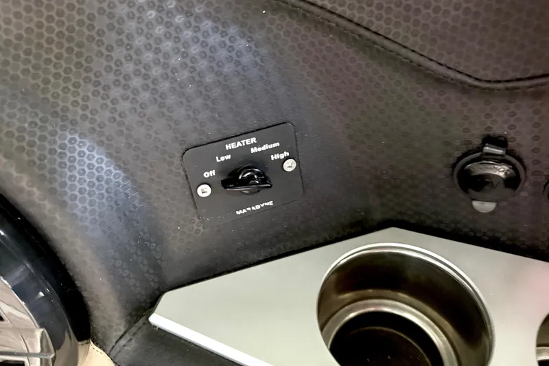 Slide: The Image of Heater control panel in 2021 Centurion Ri245 boat interior. - 39