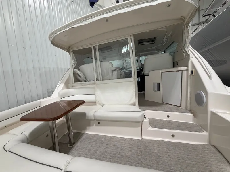 Slide: The Image of Interior of 2009 Tiara Yachts 4300 Sovran with white seating. - 49