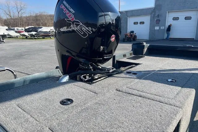 Slide: The Image of 2023 Ranger VS1782SC Reata boat with Mercury Pro XS engine in a parking lot. - 11