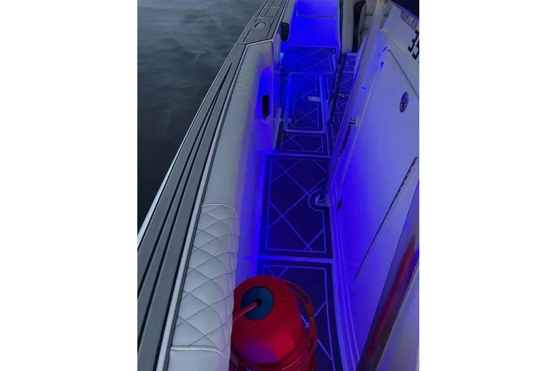 Slide: The Image of Dashboard of a 2001 Donzi 35 ZF boat with Simrad and Lowrance equipment. - 11