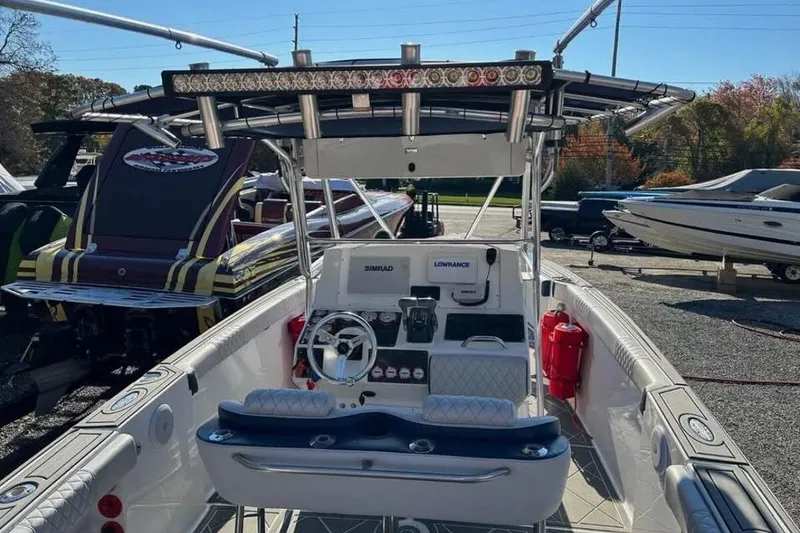 Slide: The Image of 2001 Donzi 35 ZF boat with sleek design and vibrant graphics. - 3