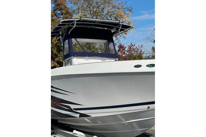 Slide: The Image of 2001 Donzi 35 ZF boat interior with sleek, modern flooring design. - 8