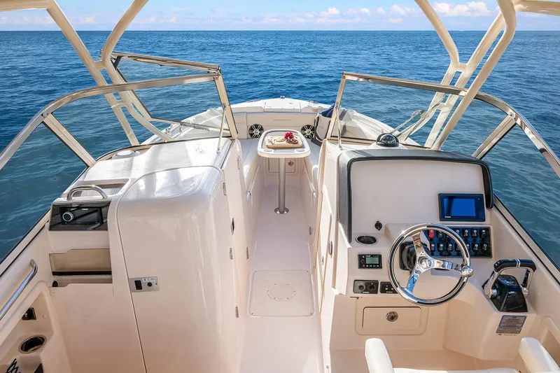 Slide: The Image of Manufacturer Provided Image: 2022 Grady-White Freedom 275 boat interior with ocean view. - 13