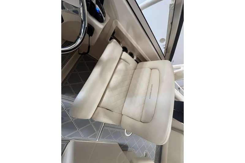 Slide: The Image of 2022 Grady-White Freedom 275 boat interior with luxurious seating and modern design. - 20