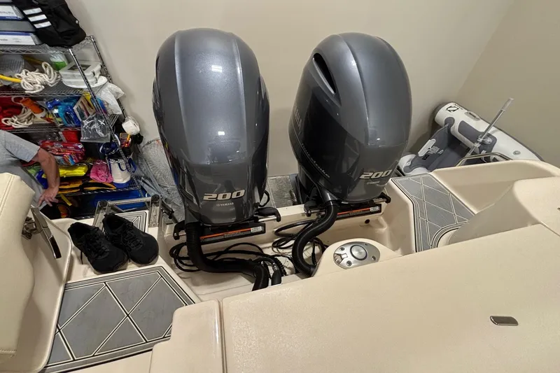 Slide: The Image of 2022 Grady-White Freedom 275 boat with dual Yamaha 200 engines in storage. - 28