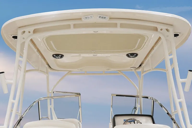 Slide: The Image of Manufacturer Provided Image: 2022 Grady-White Freedom 275 boat hardtop and helm station against blue sky. - 33