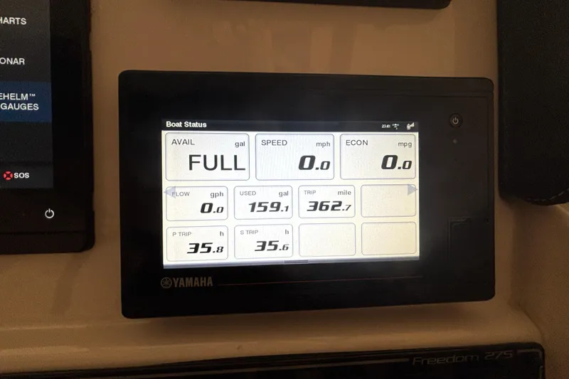 Slide: The Image of Yamaha boat display showing fuel status and trip data on Grady-White Freedom 275, 2022 model. - 9