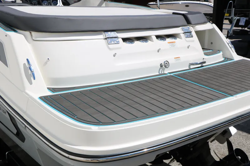 Slide: The Image of 2022 Bayliner VR5 Bowrider I/O boat with sleek swim platform and modern design. - 11