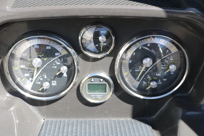 Slide: The Image of Dashboard of 2022 Bayliner VR5 Bowrider I/O with speedometer and gauges. - 19