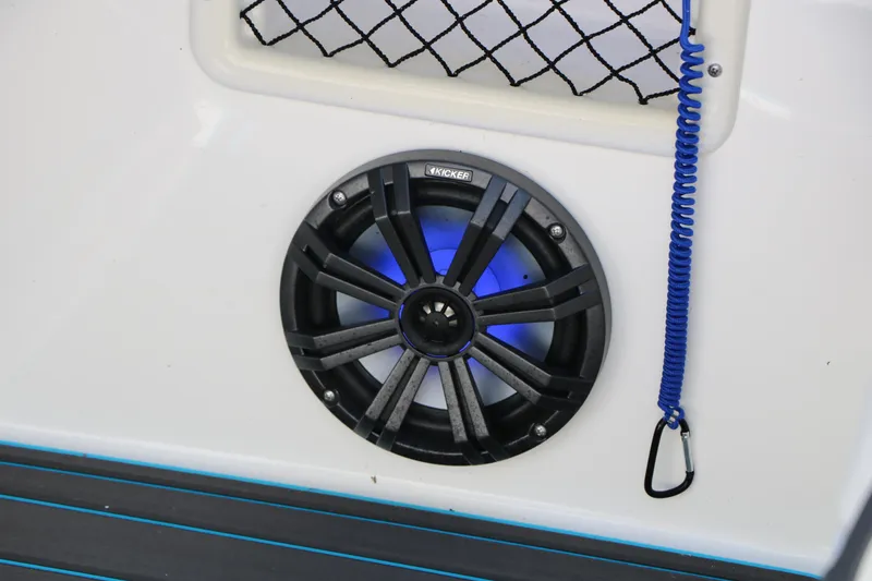Slide: The Image of 2022 Bayliner VR5 Bowrider I/O speaker with blue LED lighting and safety cord. - 28