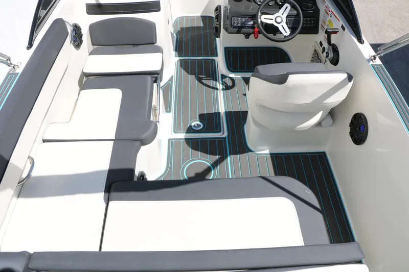 Slide: The Image of 2022 Bayliner VR5 Bowrider I/O interior with sleek seating and modern dashboard design. - 30