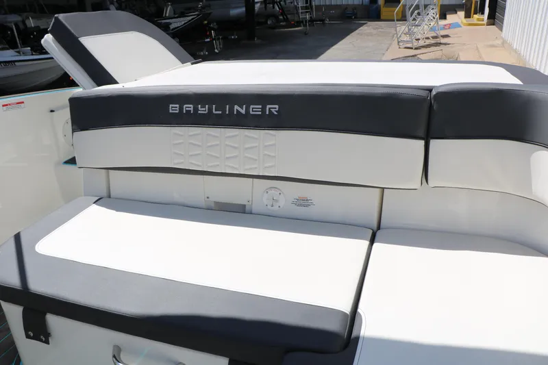 Slide: The Image of 2022 Bayliner VR5 Bowrider I/O boat seating area with sleek design and comfortable cushions. - 32